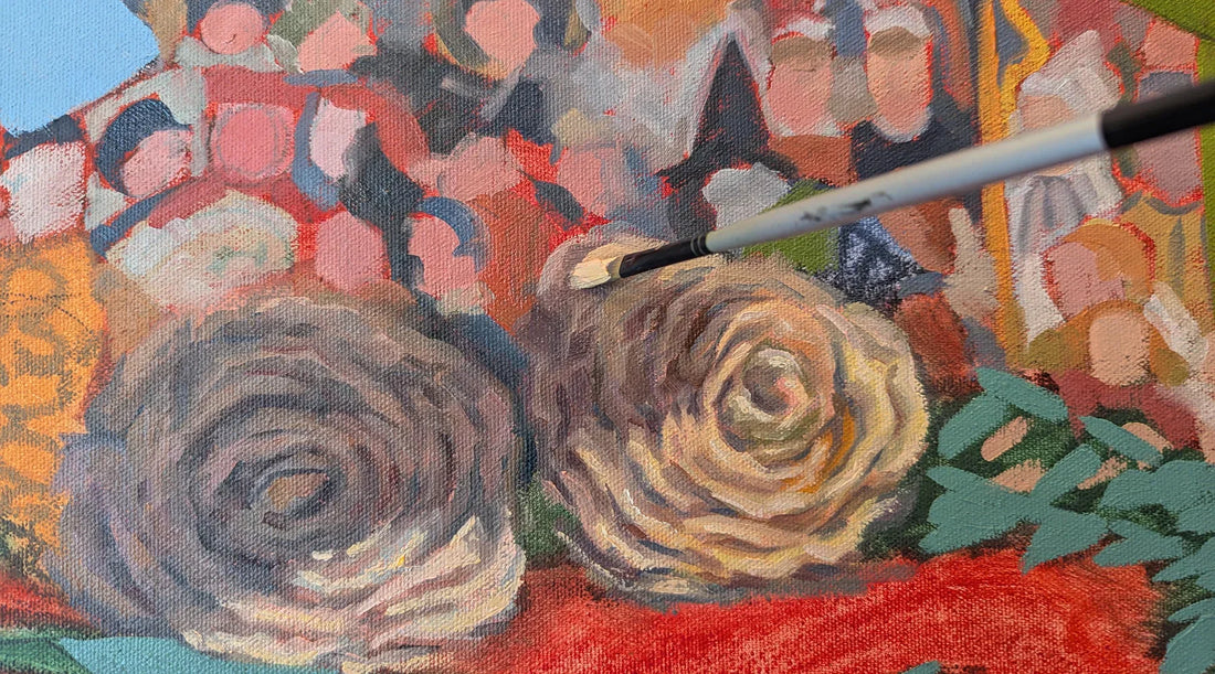 A paint brush enters from the top right hand side of the frame loaded with a tan colored oil paint pigment.